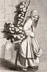 Eine Frau, die Brennholz zum Verkauf im Paris des 18. Jahrhunderts trägt, 1875